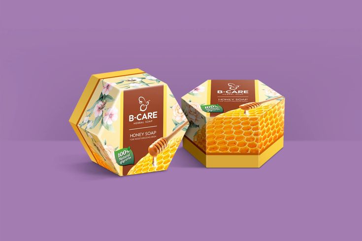 two boxes of honey on a purple background