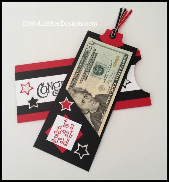 an ornament made to look like a one dollar bill with red, white and black stripes