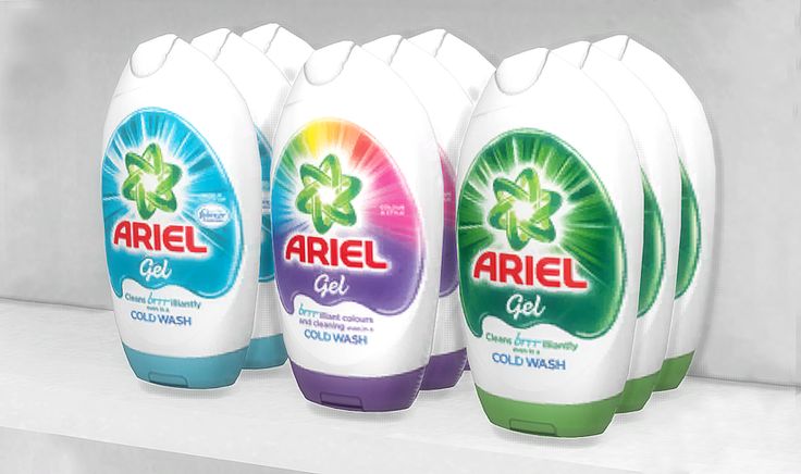 three bottles of ariel gel sitting on top of a white shelf next to each other