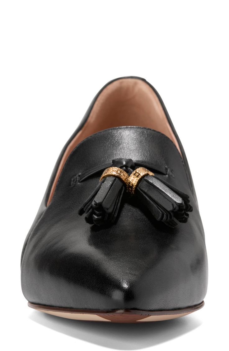 A pointy toe and low block heel frame the sleek silhouette of this tassel-adorned loafer for effortless work-to-weekend style. Leather upper/synthetic lining/rubber sole Imported Chic Slip-on Tassel Loafers For Work, Pointed Toe Loafers With Stacked Heel For Office, Office Loafers With Pointed Toe And Stacked Heel, Office Loafers With Stacked Heel And Pointed Toe, Formal Leather Tassel Loafers With Pointed Toe, Leather Tassel Loafers With Flat Heel, Office Slip-on Loafers With Tassels, Tasseled Loafers For Workwear With Flat Heel, Workwear Loafers With Tassels And Flat Heel