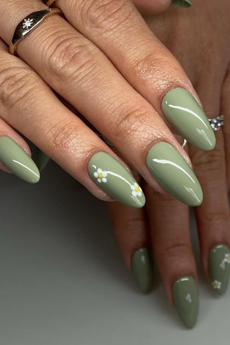 Light Green Gel Nail Designs, Soft Acrylic Nails Aesthetic, Simple Nails Olive Green, Green Color Nails Art Designs, Light Green Nail Inspo Acrylic, Light Green Nails Designs Art Ideas, Green Nails With Daisy Design, Sage Green Almond Nails With Flowers, Green Almond Short Nails