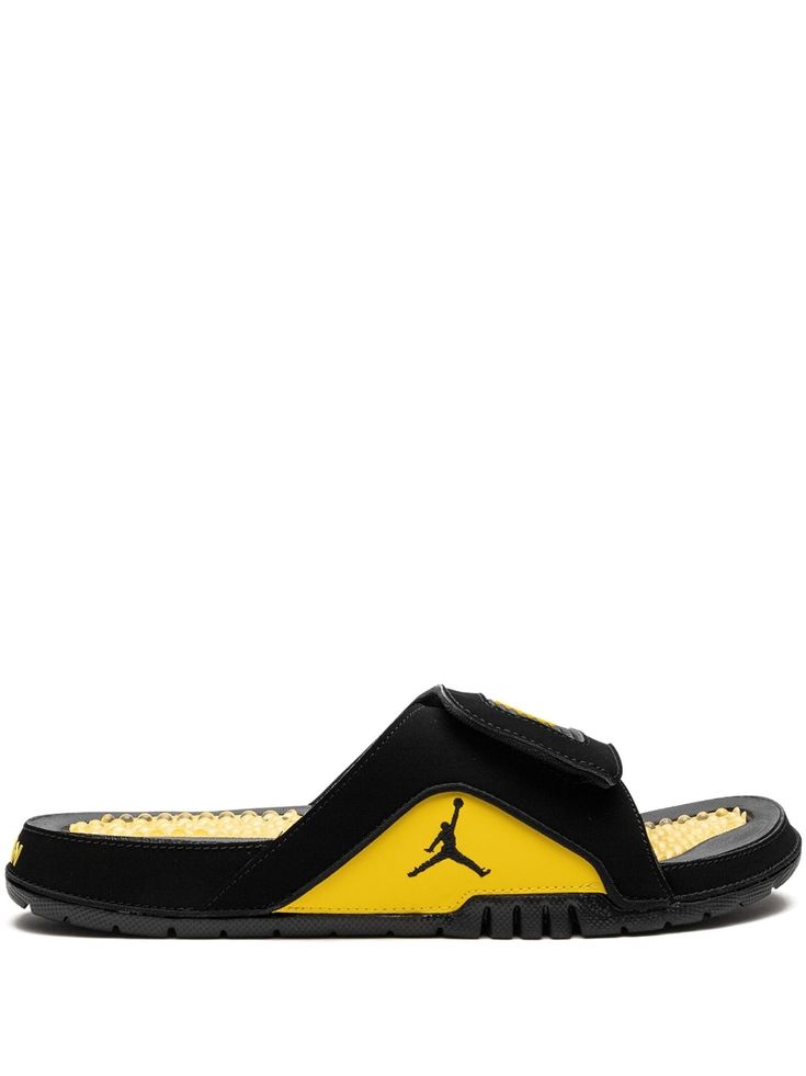 black yellow signature Jumpman motif open toe side touch-strap fastening slip-on style transparent gel-like footbed rubber sole Yellow Non-slip Slide Sandals, Yellow Open Toe Slides With Rubber Sole, Yellow Sporty Non-slip Sandals, Yellow Open Toe Synthetic Slides, Yellow Sporty Open Toe Sport Sandals, Yellow Cushioned Slides With Round Toe, Yellow Open Toe Sport Sandals, Yellow Synthetic Slip-on Slides, Yellow Slides With Rubber Sole And Round Toe