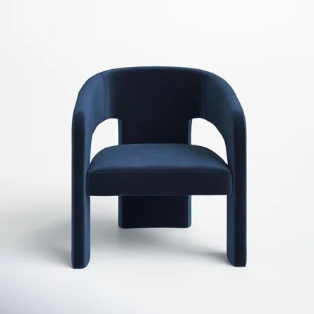 a blue chair sitting on top of a white floor next to a black object in the background