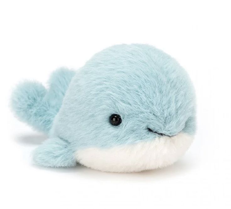 a small blue stuffed animal with white feet