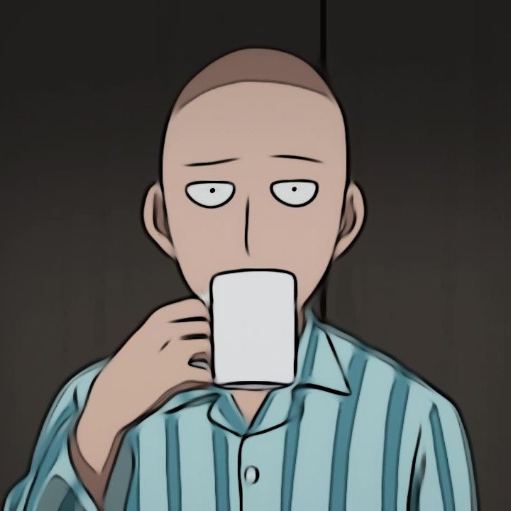 a man holding a coffee cup in front of his face