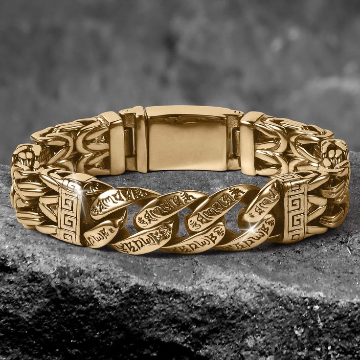 Elevate your wristwear game with this exquisite bracelet that effortlessly combines boldness and sophistication. Crafted from premium grade stainless steel, finished in yellow gold. With meticulous attention to detail this bracelet boasts a distinctive design that exudes confidence and style. A captivating curb design that commands attention and admiration is mixed within chunky links which creates a dynamic visual texture. This bracelet is sure to become an indispensable part of your accessory Luxury Gold-tone Metal Bracelet, Gold-tone Stainless Steel Bracelets, Luxury Yellow Gold Metal Cuff Bracelet, Luxury Metal Bangle Chain Bracelet, Luxury Tarnish Resistant Stainless Steel Bracelets, Modern Gold-tone Stainless Steel Bracelet, Luxury Stainless Steel Tarnish Resistant Bracelets, Luxury Tarnish-resistant Stainless Steel Bracelets, Luxury Stainless Steel Tarnish-resistant Bracelets