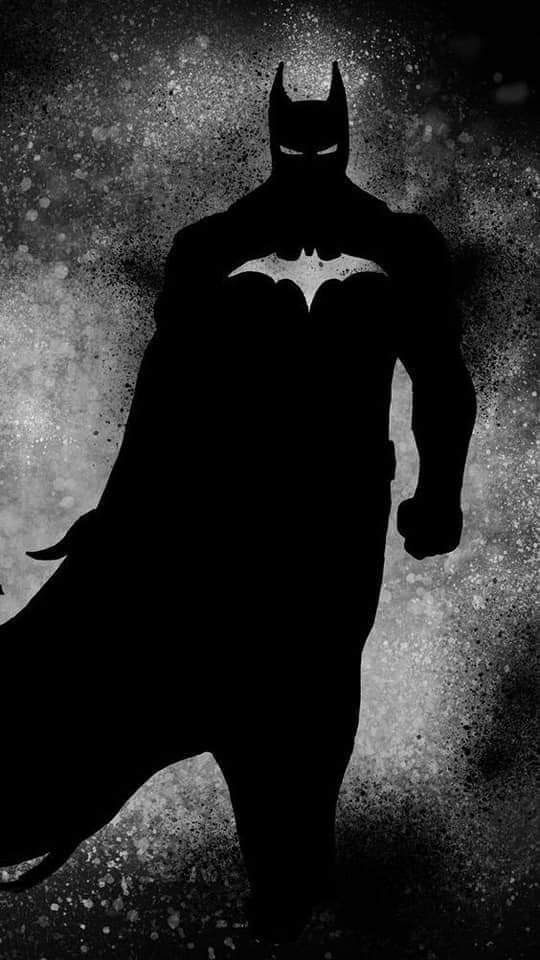 the silhouette of a batman standing in front of a black and white background with splots