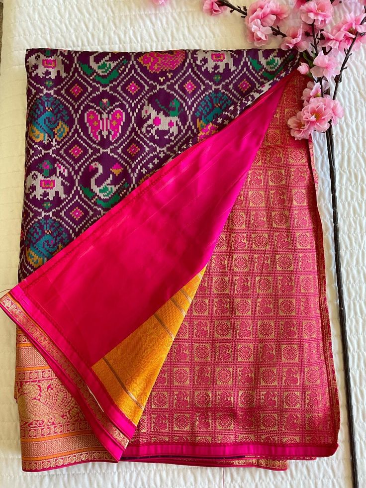 The hallmark of a Patola Silk Sari lies in its rich and vibrant colors, intricately woven motifs, and geometric designs that reflect the cultural heritage of Gujarat's Patan region. These motifs often include traditional symbols such as flowers, animals, birds, and religious motifs, each carrying its own significance and symbolism. Made from pure silk, the Patola Sari exudes a luxurious sheen and a soft, smooth texture that drapes gracefully around the body. Its lightweight yet durable fabric ma Traditional Handloom Wear As A Gift, Traditional Handloom Dupatta As Gift, Designer Multicolor Saree With Dupatta, Traditional Festive Saree As A Gift, Traditional Festive Saree For Gift, Designer Multicolor Traditional Drape Dupatta, Traditional Zari Weaving Dupatta, Traditional Banarasi Silk Dupatta As Gift, Traditional Banarasi Silk Dupatta For Gift