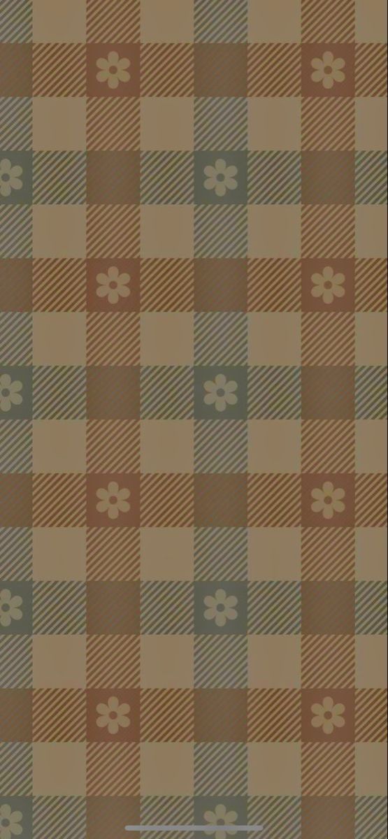 a brown and tan checkered wallpaper with small flowers on the bottom right corner