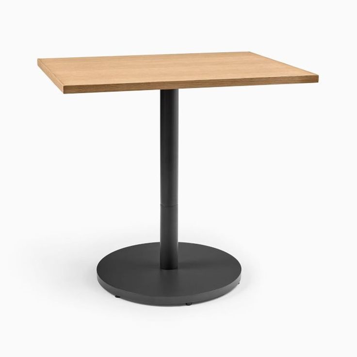 a square table with a black base and a wooden top on an isolated white background