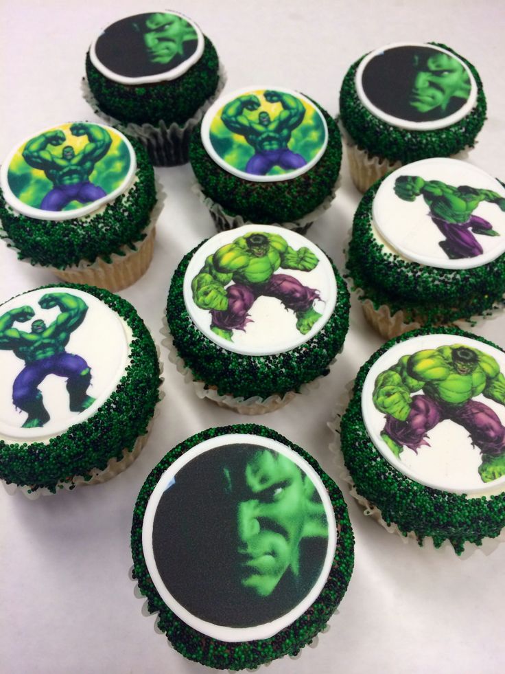 cupcakes decorated with green frosting and images of the incredible hulk - man