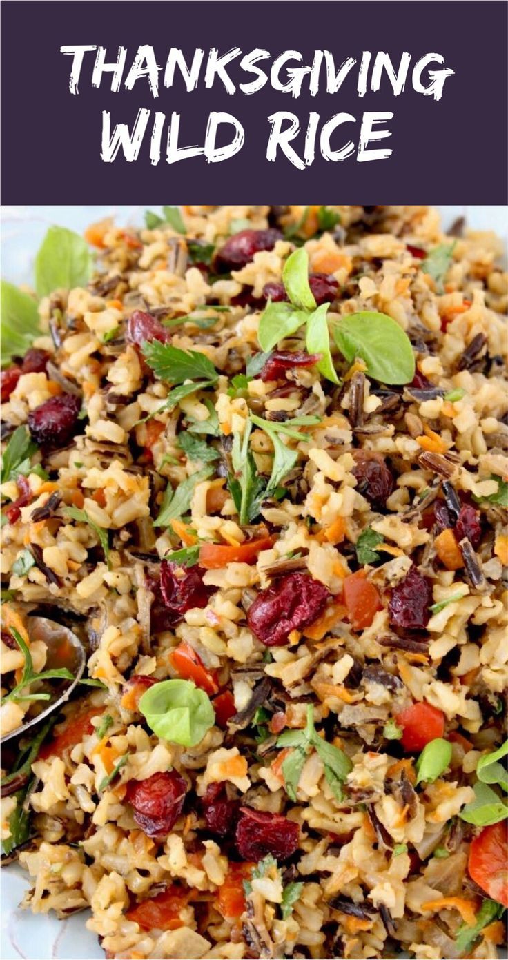 cranberry wild rice salad on a white plate with text overlay that reads, cranberry wild rice platter