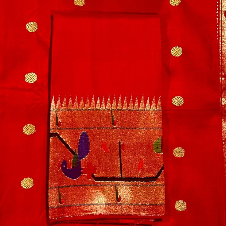 This exquisite regal paithani saree is handwoven in vermillion red color. Traditional gold zari coin buttis adorn the body while the golden zari border is decorated with handwoven brocade border. The elaborate pallu is woven with colorful peacocks along with winding vines and flowers. The saree comes with plain blouse with matching borders. Approximate Length 6.5 mtrs (inclusive of blouse length)Height - 48- 52" Approximate weight - 1.8 lbs Saree comes with fall and picot done. Blouse piece is cut. Kindly Note : The colors you see on your device may vary due to the color reproduction, brightness and resolution of individual devices. If you'd like more clarity before your purchase, please contact our support team. Paithani Silk Traditional Wear For Diwali, Traditional Gold Unstitched Saree, Paithani Silk Saree With Zari Work For Traditional Ceremonies, Festive Paithani Silk Traditional Wear, Gold Traditional Wear With Zari Weaving For Festivals, Navratri Paithani Silk Saree For Traditional Ceremonies, Festive Paithani Silk Saree For Puja, Red Paithani Silk Traditional Wear With Motifs, Transitional Paithani Silk Traditional Wear With Zari Weaving