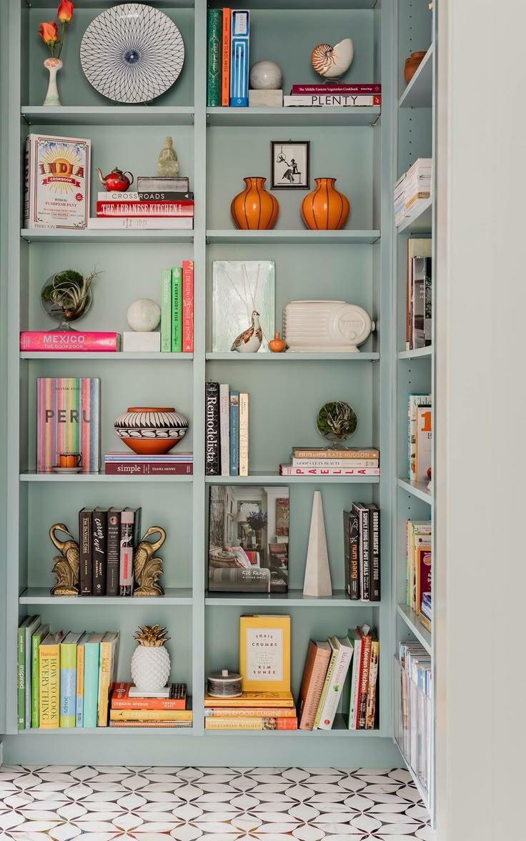 a bookshelf filled with lots of different types of books