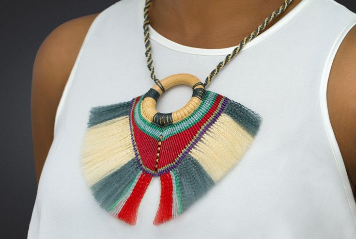 Show off your Southwest style and love for unique jewelry with this micro macrame native American fringe necklace. Featuring a variety of beautiful threads that are fringed and a fantastic pattern, this long colorful indigenous macrame necklace is a lovely way to wear some macrame art! It's the ideal native American necklace for those that love indigenous tribal macrame jewelry. Wear this Navajo jewelry with pride and enjoy handmade macrame to the fullest. This psy trance Goa necklace will be su Hippie Style Multicolor Macrame Jewelry, Artisan Multicolor Macrame Jewelry, Bohemian Multicolor Macrame Necklaces, Bohemian Multicolor Macrame Necklace, Multicolor Macrame Necklace For Festivals, Unique Multicolor Macrame Jewelry, Bohemian Thread Jewelry For Festival, Bohemian Fringe Necklaces For Gifts, Bohemian Multicolor Fringe Jewelry