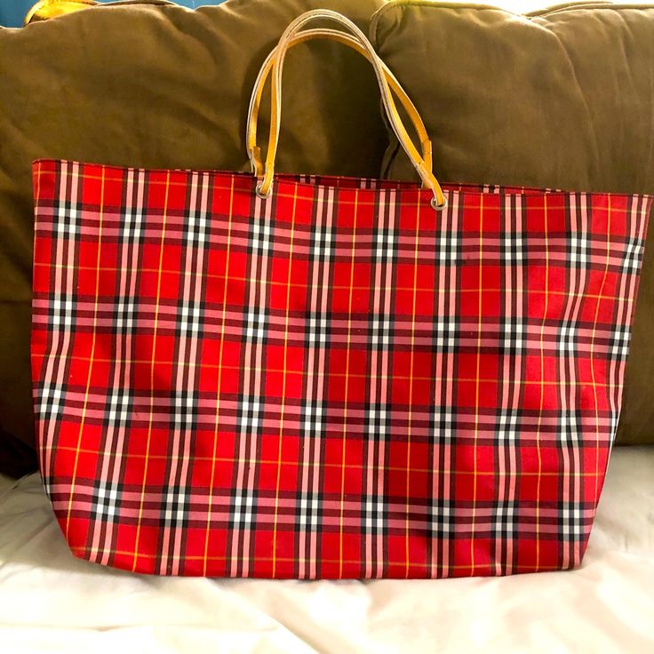 Very Gently Used Red Plaid Burberry Tote Bag With Tons Of Room, Lined Inside. Measures: 14.5” Long, 21.5” Across And 6” Wide. There Are Some Small White Spots And Some Slight Scuffing On The Bottom Of The Bag. Please See Photos Before Ordering. Designer Red Shoulder Bag With Large Capacity, Designer Large Capacity Red Shoulder Bag, Red Bags With Large Capacity For Everyday Use, Trendy Red Bag With Large Capacity, Trendy Large Capacity Red Bag, Designer Red Bags For Errands, Red Satchel For Daily Use With Dust Bag, Designer Red Tote Bag, Red Casual Bags For Shopping