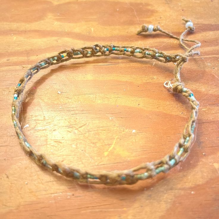 Handmade Hemp & Wire Beaded Bracelet Blue/Green Seed Beads Light Brown Hemp Rope Length 9.5-12.5 In. Adjustable Sea Glass Crafts Jewellery, Wired Glass, Hemp Bracelets, Hemp Rope, Sea Glass Crafts, Glass Beaded Bracelets, Blue Bracelet, Glass Crafts, Womens Jewelry Bracelets