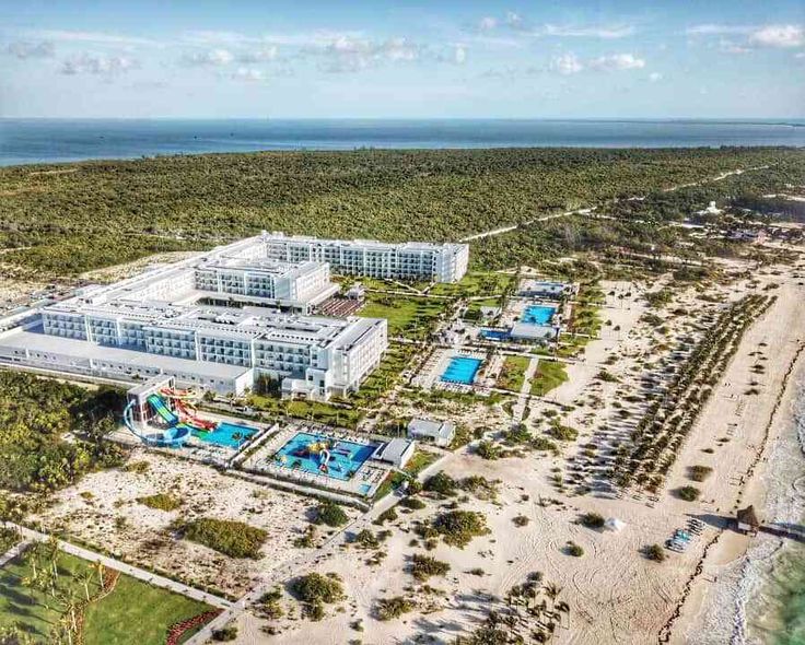 an aerial view of the beachfront and resort area at grand velase in cancu