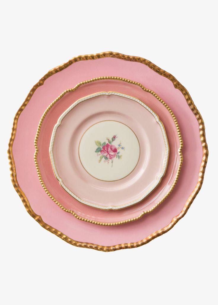 three pink and gold plates with roses on the rims, all in different colors