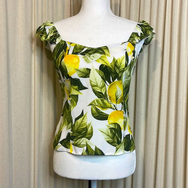 Nwt- H&M Lemon Fruit Ruffle Sleeve Blouse Size Small Super Cute, Wish It Fit Me. Armpit To Armpit Is Roughly 17 Inches In Total Length From The Top Of The Sleeve To The Bottom Is Roughly 20.5 Inches. Tag Fruit, Shirt, Fruit, Blouse, Lemons, Lemon Shirt, Fruit Shirt Contemporary, Summer Shirt, Spring Shirt, Ruffles Date, Night, Pinup, Rockabilly Dainty, Feminine Sexy, Flirty, Diva Fashion, Fashionista Crop Top Tank Top Boohoo Bohemian Gypsy Boho Hippie Festival Summer Concert Glam Urban Floral Fl Summer Lemon Print Tops, Summer Yellow H&m Tops, H&m Fitted Blouse For Brunch, Fitted H&m Blouse For Brunch, Fitted Summer Tops With Lemon Print, Fitted Summer Top With Lemon Print, Fitted Lemon Print Summer Tops, Fitted Lemon Print Tops For Summer, Fitted Tops With Lemon Print For Summer