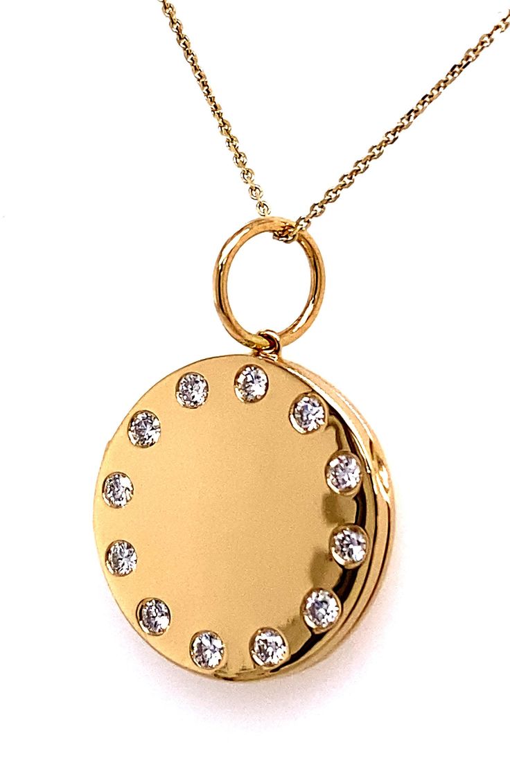 PRODUCT DESCRIPTION: 14k Gold Circle Locket Pendant Necklace With Diamond Border / Unique 14k Circle Disk Locket With Diamonds / Gold Diamond Locket Pendant * Gold Purity: Solid 14k Yellow Gold * Gold Weight: 5.9 Grams * Diamond Quantity: 12 Stones * Diamond Weight: .40 Carats * Diamond Quality: Natural Earth Mined White Diamonds * (G-H Color / VS Clarity Stones) * Charm Dimensions: - (20mm Height) x (20mm Width) x (3mm Depth) - (8mm Bale Loop) * Chain Details: *Solid 14k Gold Cable Chain With L Yellow Gold Coin Pendant Jewelry, Yellow Gold Jewelry With Coin Pendant, Yellow Gold Round Diamond Necklace For Celebration, Engraved Yellow Gold Jewelry For Celebration, White Gold Medallion Jewelry With 17 Jewels, Elegant Yellow Gold Coin Jewelry, Round Engraved Necklaces For Celebration, Classic Yellow Gold Jewelry For Celebration, Gold Round Diamond Necklace For Gift