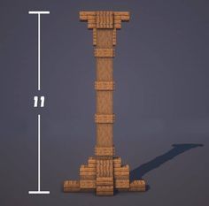 a tall wooden tower sitting next to a ruler