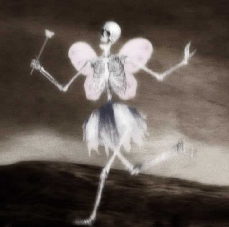 a skeleton dressed as a fairy dancing in the dark