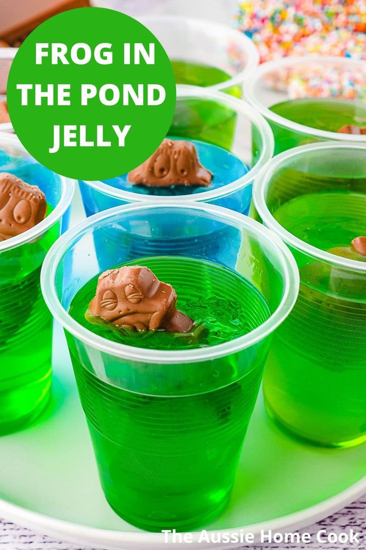 frog in the pond jelly cups on a plate with sprinkles and candy