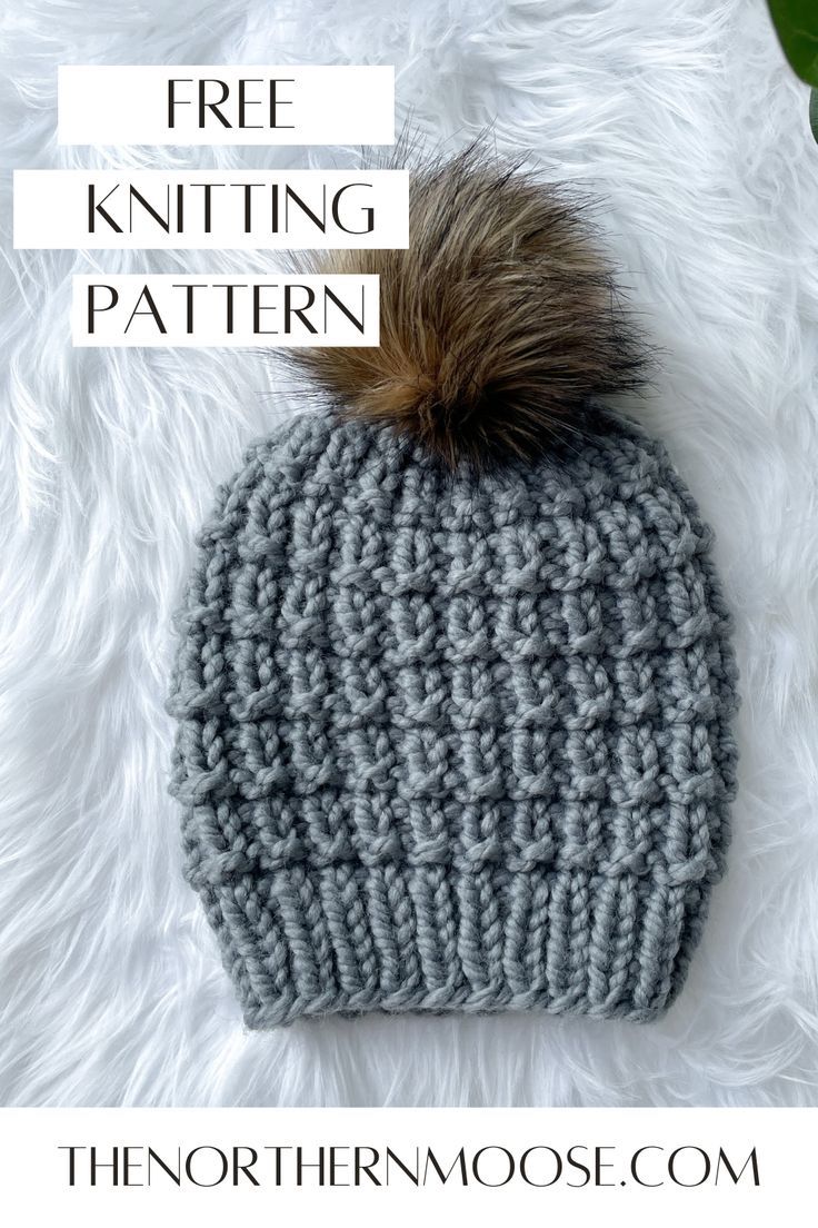 a gray knitted hat with a brown pom - pom on top and text overlay that says free knitting pattern