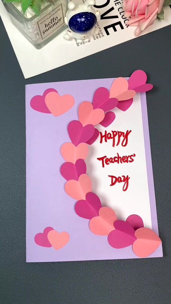 valentine's day card with paper hearts on it