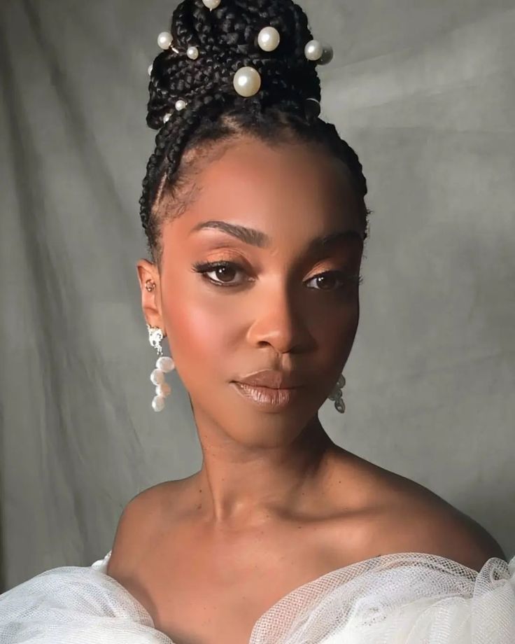 Bridal braids 🤍 I had fun creating the first image as I've always wanted to show that braids & natural hairstyles can be beautiful for all occasions, the second image created by the @bridesbyaina.m . ✨ Braids by @styledby.ellaabergel & @keziahgordonmua #braidstyles #braids #braidgang #bridalbraid #naturalhair #naturalhairstyles #protectivestyles #bridalmodel #bridalshoot #bridalphotography #bridalmakeup #pearl #pearls #melaninpoppin #blackbeauty Wedding Braids Hairstyles Black Women, Black Braided Wedding Hairstyles, Brides With Box Braids, Black Brides Hairstyles Braids, Cornrow Wedding Hairstyles, Pearl Hairstyles Black Women, Black Wedding Hairstyles Natural, Pearls In Braids, Braids Wedding Hairstyles Black Women