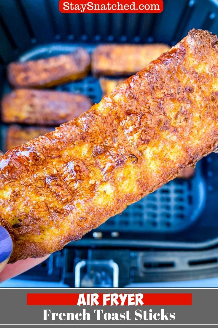 someone is holding up an air fryer french toast sticks