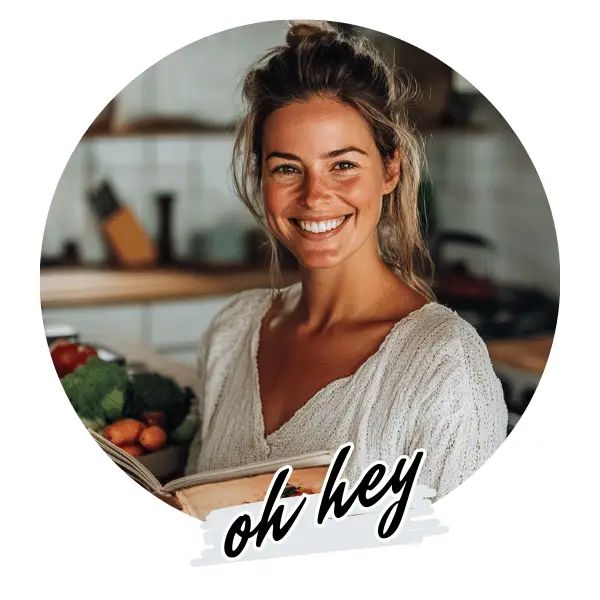 a woman smiling while holding a bowl of food in her hands with the words ok key on it