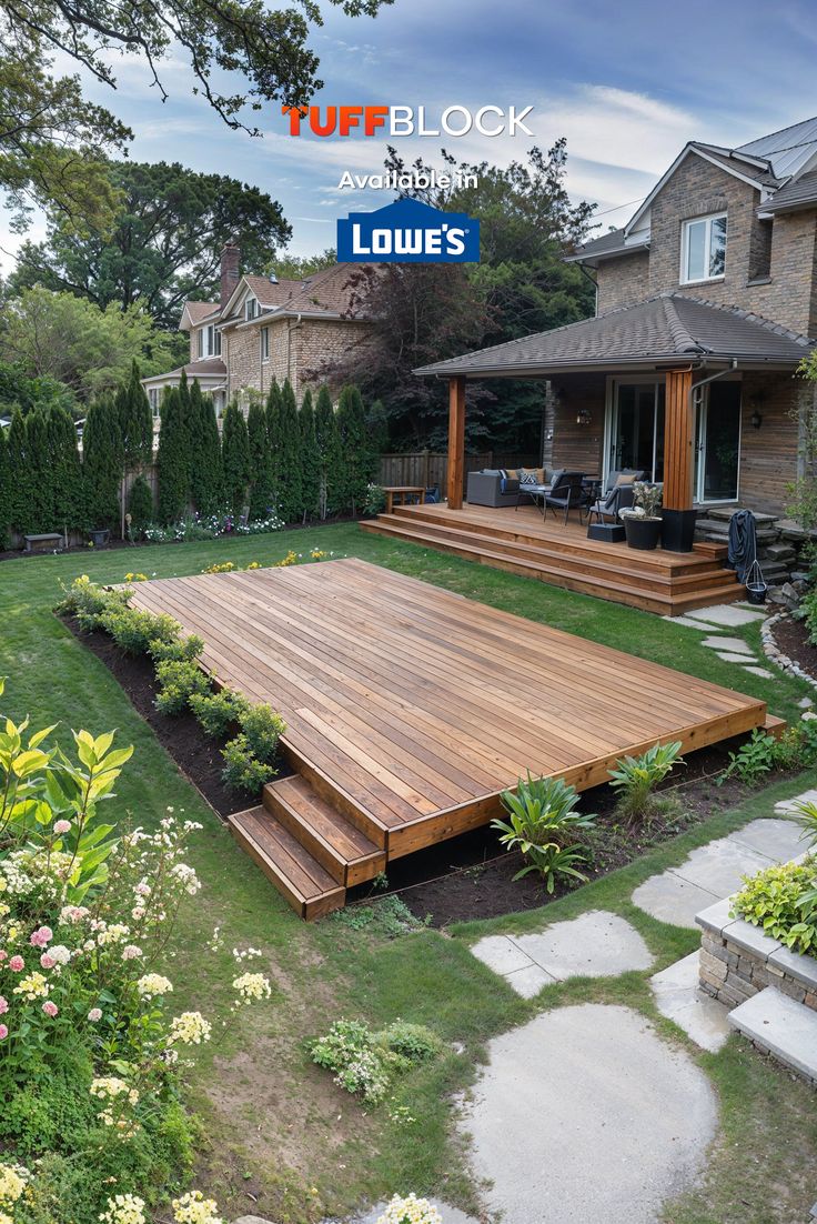 ground level deck with stairs in backyard of beautiful home Deck With One Step Down, Outdoor Platform Ideas, Floating Deck Ideas Ground Level, Small Floating Deck, How To Build A Deck, Low Level Deck, Tuffblock Deck, Low Profile Deck, Build A Floating Deck