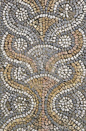 a mosaic tile floor with an intricate design