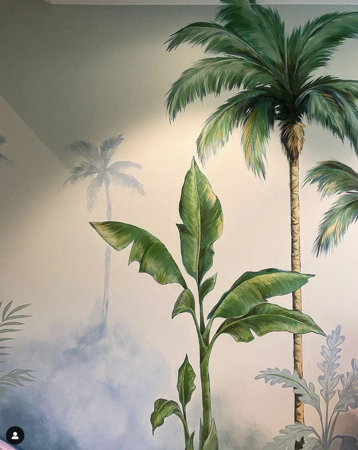 a painting of palm trees on the wall