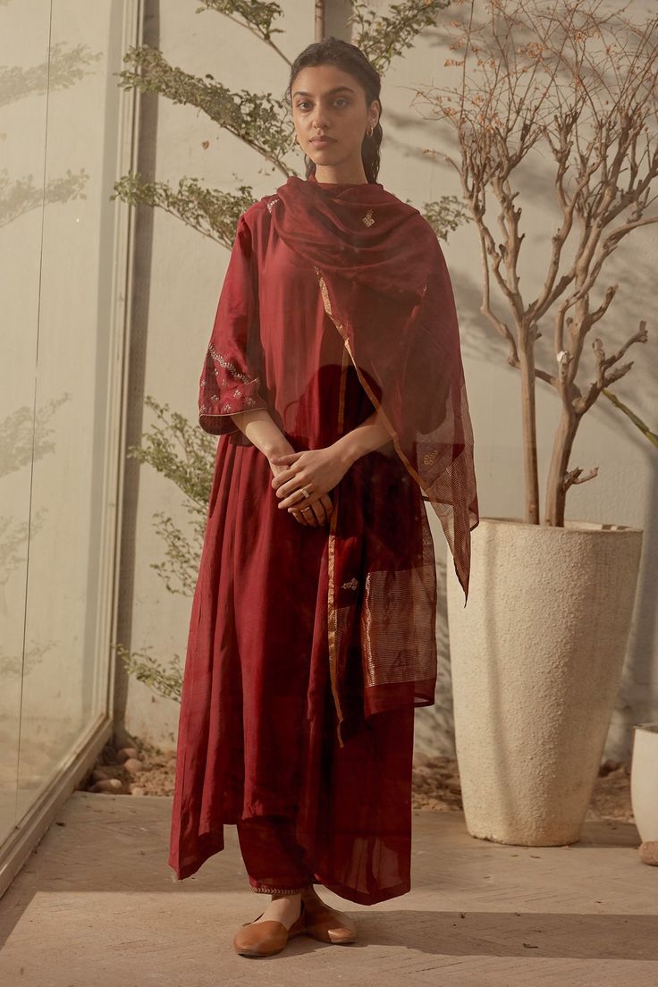 Deep red cotton silk kurta with dabka and floral hand embroidered sleeves. Comes with pant and a chanderi dupatta.
Components:3
Pattern:Hand embroidered
Type of Work:Dabka, Floral
Neckline:Round
Sleeve Type:Three quarter
Fabric:Kurta and Pant : Cotton silk, Dupatta : Chanderi
Color:Red
Other Details:
Side pockets on kurta
Occasion:Mehendi and Haldi - Aza Fashions Chanderi Dupatta, Red Kurta, Kurta Pant Set, Embroidered Sleeves, Silk Kurta, Kurta With Pants, Silk Dupatta, Fashion App, Set For Women