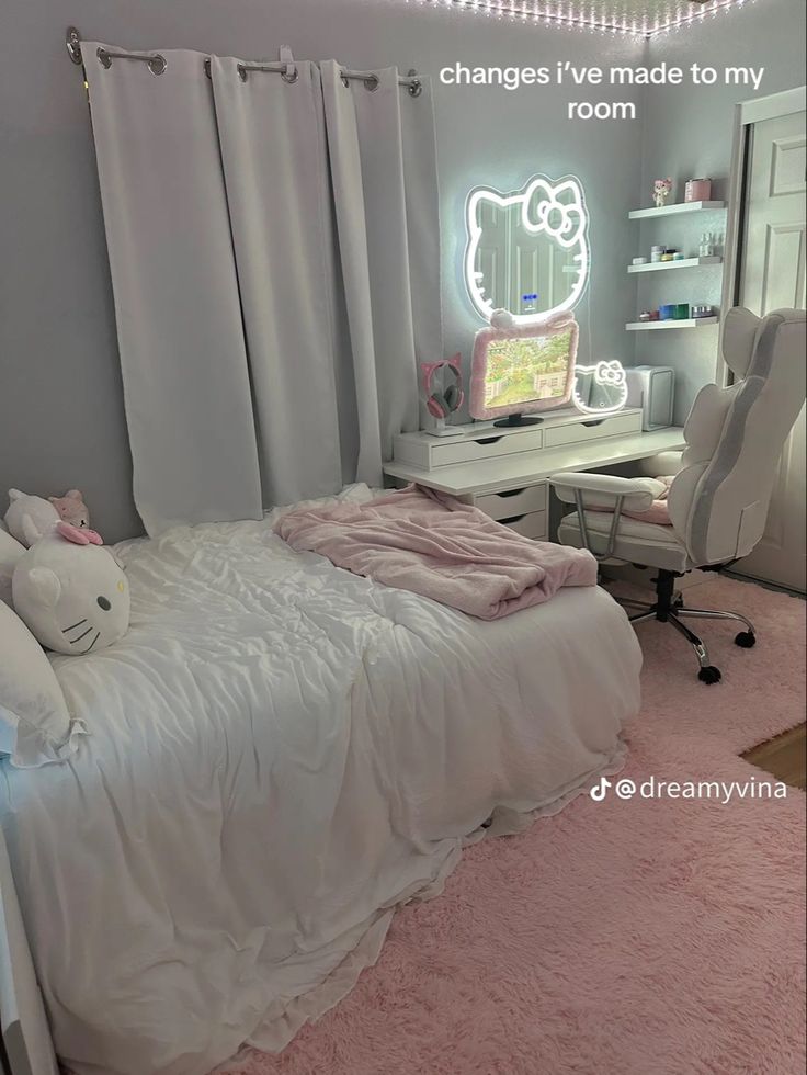 a bedroom with a hello kitty bed and pink carpet