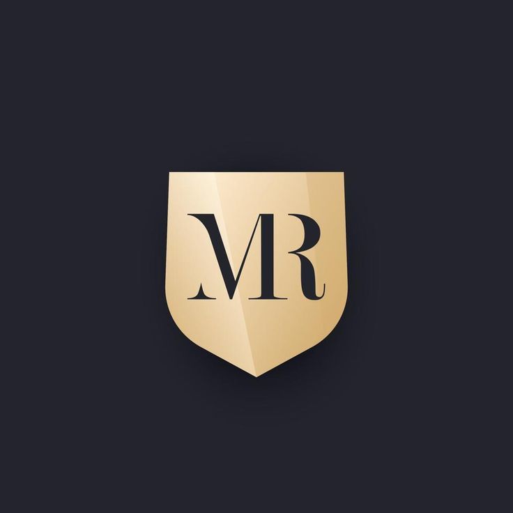 a golden shield with the letter m and b on it, against a black background