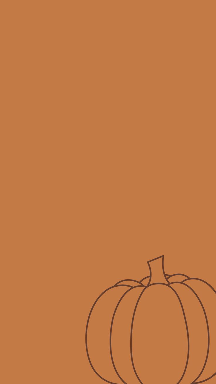 a drawing of a pumpkin on a brown background