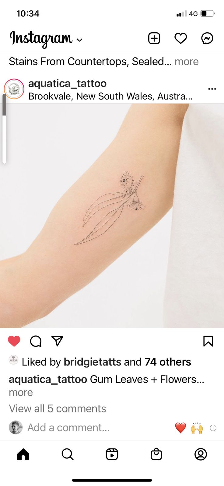 a person with a tattoo on their arm