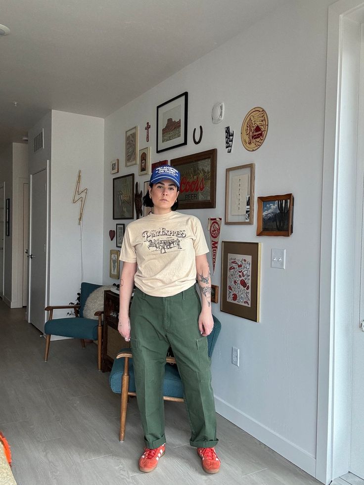 "90s military fatigue green pants  no tag size  Rise: 12\" Flat across: 19\" Inseam: 28\"  Thigh flat: 14\" hips: 23\" Boho, retro, 60s, 70s, 80s, and 90s vibes  Vintage items may have imperfections, if they are major or extremely visible they will be noted Smoke free home  No shedding pets Cleaned before mailing + urban outfitters  + free people + madewell  + vintage  Vintage items may/will probably have imperfections, if they are major or extremely visible they will be noted. Buying vintage items could mean they are different than what you had expected, but still just as lovely because they have lived a full life and have a story to tell!  We know that paying for shipping isn't ideal, but we are a small company and vintage items can be quiet heavy since they are made out of better materi Vintage Cargo Pants For Spring Streetwear, Vintage Cargo Style Pants For Streetwear, Retro Cotton Cargo Bottoms, Retro Cotton Cargo Pants For Fall, Vintage Cargo Style Pants For Spring, Vintage Relaxed Fit Cargo Pants For Spring, Green Cotton Work Pants For Fall, Retro Green Pants For Fall, Vintage Green Pants For Fall