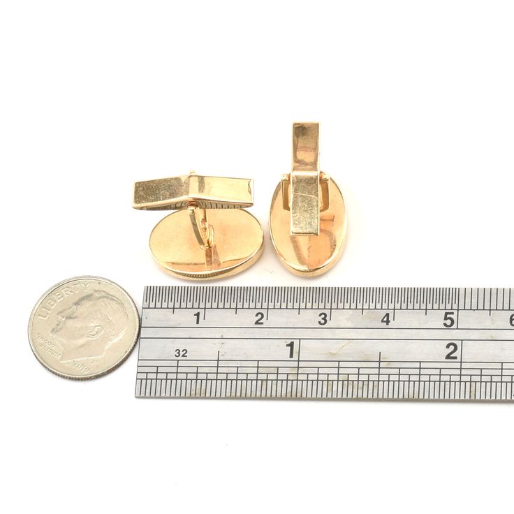 Surprise your favorite person (or treat yourself) with these gorgeous cufflinks! These exquisite 14 karat yellow gold cuff links are in an oval polished design and completed with toggle closure. They are stamped 14K. Each cuff link is 18.43 millimeters (just under 3/4 inch) long by 12.61 (1/2 inch) wide. The pair together weighs a hefty 18.18 grams. Good estate condition. We are listing several pieces of estate jewelry, along with other items fresh from fine North Carolina estates. We are happy Polished 14k Gold Cufflinks, Gold 14k Polished Cufflinks, 14k Gold Polished Cufflinks, Classic Oval Cufflinks For Business, Classic Gold Oval Cufflinks, Oval Polished Cufflinks For Business, Oval Gold Cufflinks For Gift, Classic Oval Cufflinks For Anniversary, Classic Oval Cufflinks As Gift