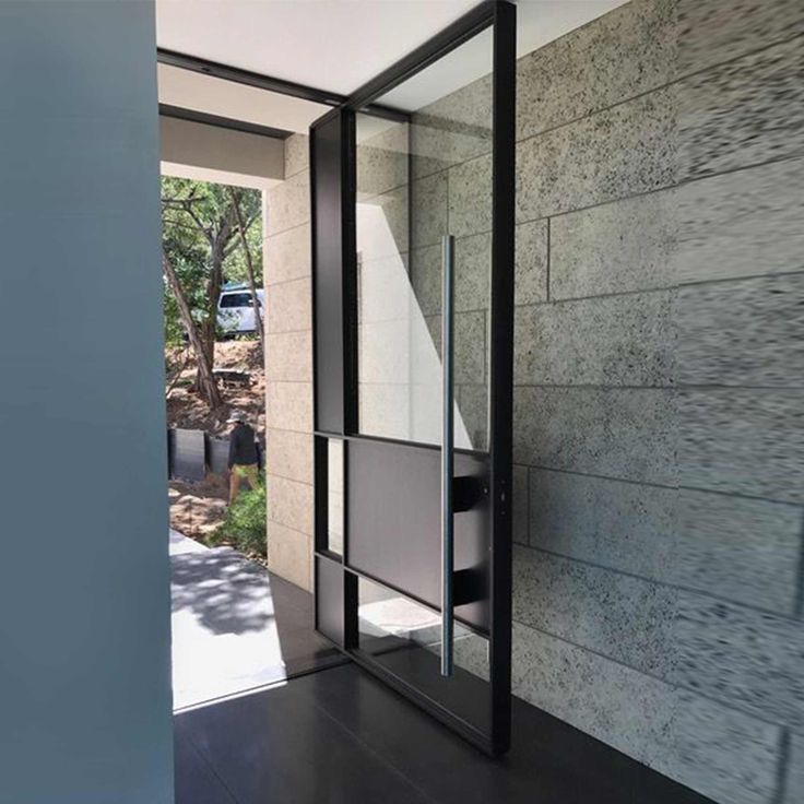 IWD pivot-door-steel-entrance-modern-clean-friendly-square-top-black-cid-pv024-clear-glass-long-handle Steel Pivot Door, Doors Pivot, Door Sidelights, Pivot Hinge, Outdoor Scenery, Wine Cellar Door, Door Handles And Locks, Iron Entry Doors, Pivot Door