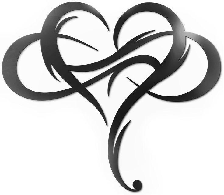 a heart shaped metal wall hanging on the side of a white wall with black swirls