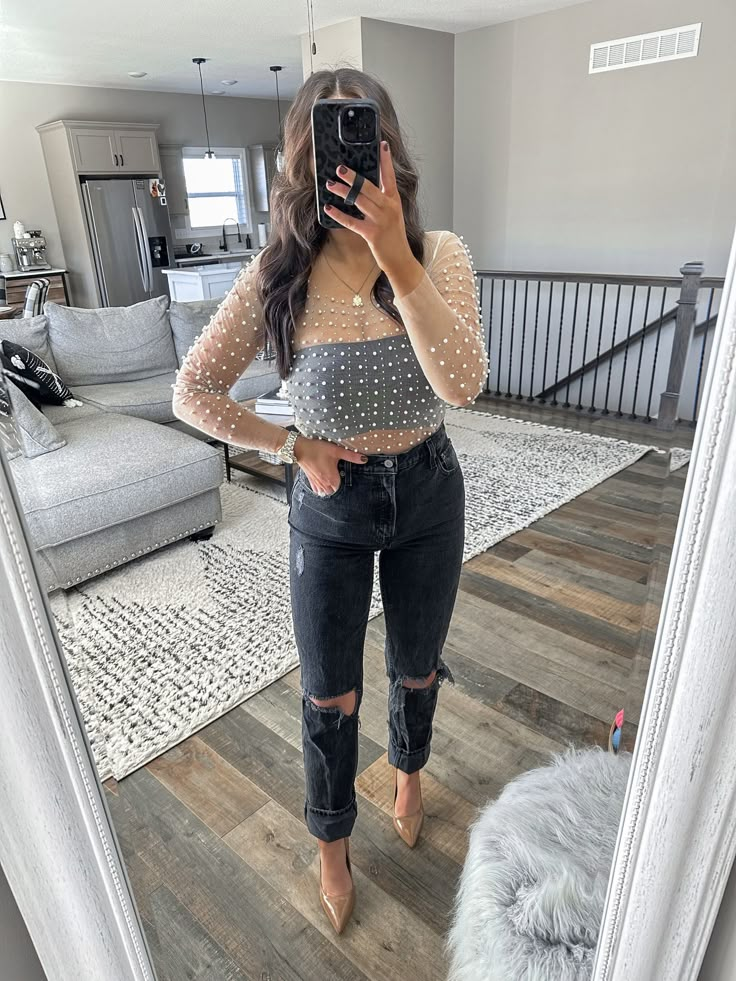 Crop Top Night Out Outfit, Date Night Outfit Bar, Black Sheer Top Outfit Jeans, All Black Bridal Shower Outfit, Jeans And Blouse Outfit Night Out, New Year’s Eve Nashville Outfit, Jeans Outfit Night Out Winter, Sheer Top And Jeans Outfit, Lounge Bar Outfit Night