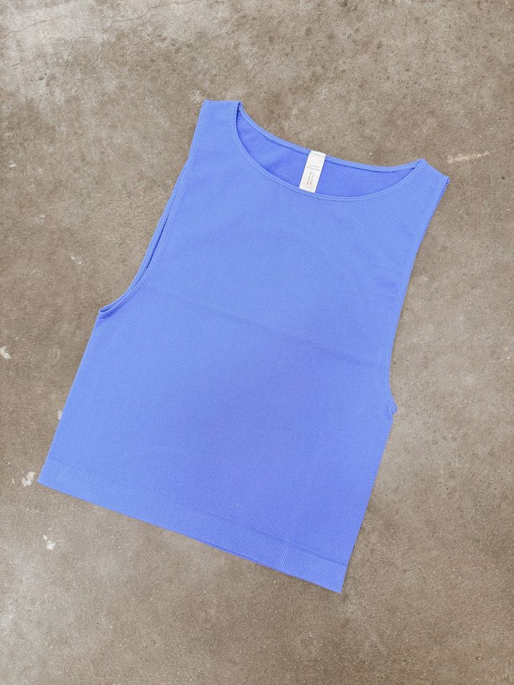 Go the distance in our Run Away Crop Top! Made from high-quality seamless ribbed fabric, this sleeveless crew neck crop top is perfect for any workout or casual day out. Blue Crew Neck Crop Top For Sports, Blue Ribbed Athleisure Tops, Blue Athleisure Crop Top For Summer, Blue Sleeveless Crop Top For Yoga, Sleeveless Blue Crop Top For Yoga, Blue Seamless Sleeveless Crop Top, Blue Sleeveless Seamless Crop Top, Sleeveless Seamless Blue Crop Top, Blue Crew Neck Crop Top For Workout