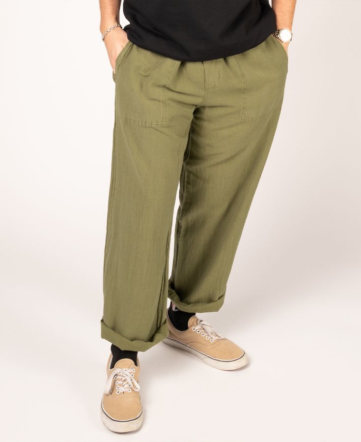 These men's hemp yoga pants contain hemp and viscose for a softer feel and ease of movement when doing poses or just wearing around town. Whether you are lounging, walking, dancing or just chilling, these men's hemp pants will fit your life's moves perfectly. Includes a drawstring waist and an elastic back. This cut also features two front pockets and one single back pocket (right side). Ethically Made in Nepal. 50% viscose, 30% hemp, 20% cotton. Moss. Comfortable Green Bottoms With Relaxed Fit, Relaxed Yoga Bottoms, Relaxed Fit Straight Leg Harem Pants For Yoga, Casual Bottoms For Meditation, Casual Relaxed Fit Cargo Yoga Pants, Casual Relaxed Fit Bottoms For Meditation, Casual Long Pants For Meditation, Green Relaxed Fit Yoga Pants With Pockets, Relaxed Fit Wide Leg Meditation Pants