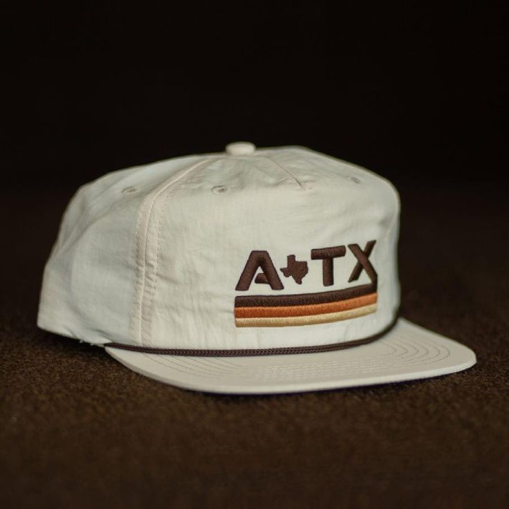 We're taking you back to simpler times with this vintage-inspired Austin, Texas grandpa rope hat. This instant classic features a medium crown height, lightweight nylon, breathable fabric, a snapback closure, and a pliable bill for a customized fit. Want to spend a quiet day on the water? Our ATX snapback hat is also water resistant! Hook yourself the hat that will keep you in style. Texas Hat, Fun Hats, Dope Hats, Baseball Snapback, Flat Bill Hats, Simpler Times, Golf Hats, Quality Hats, University Of Texas