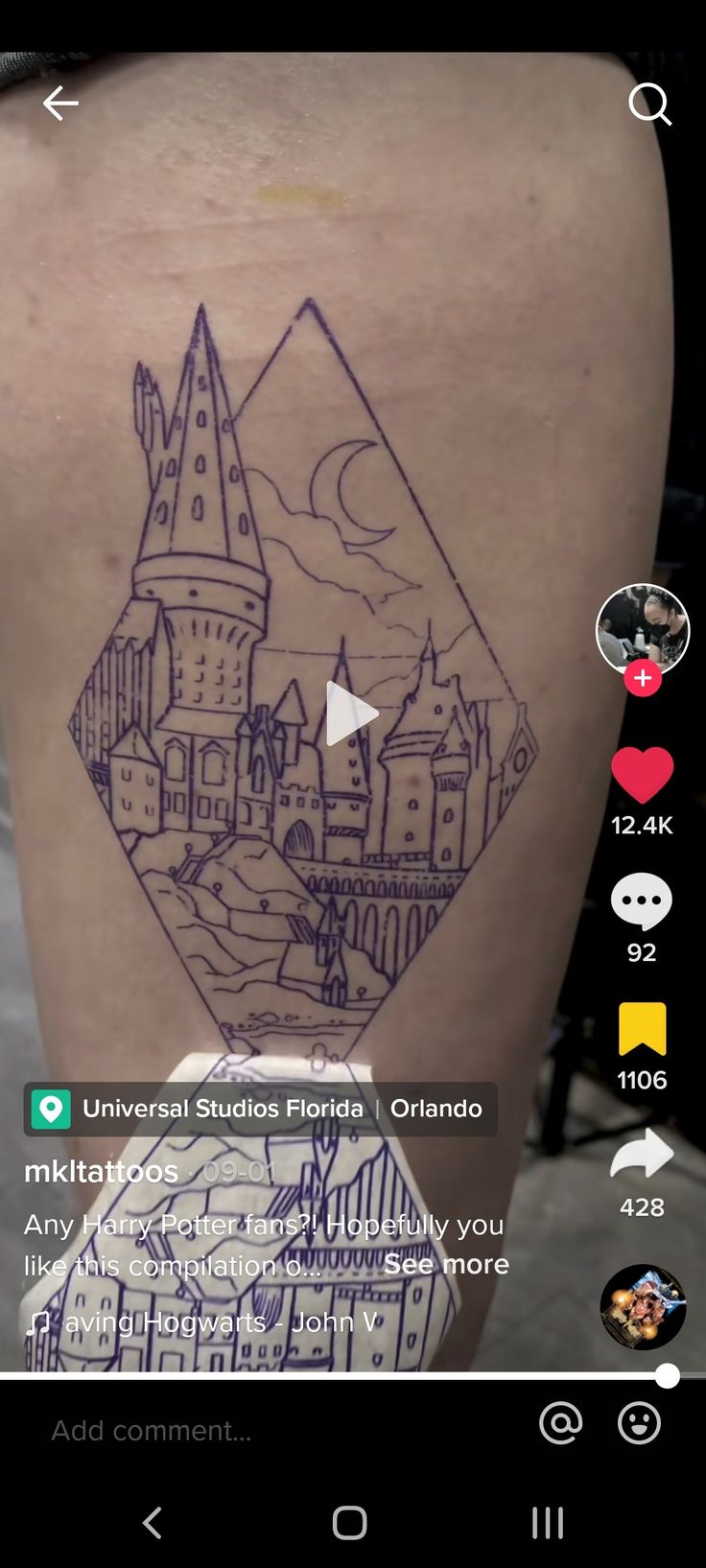 the back of a woman's thigh with an image of a castle on it